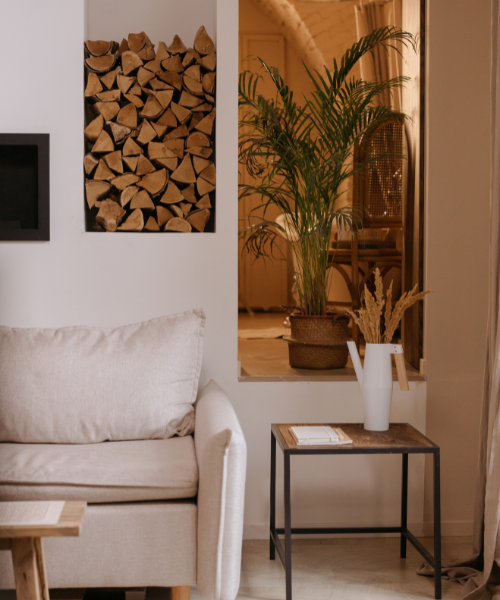 A living room filled with furniture and a mirror